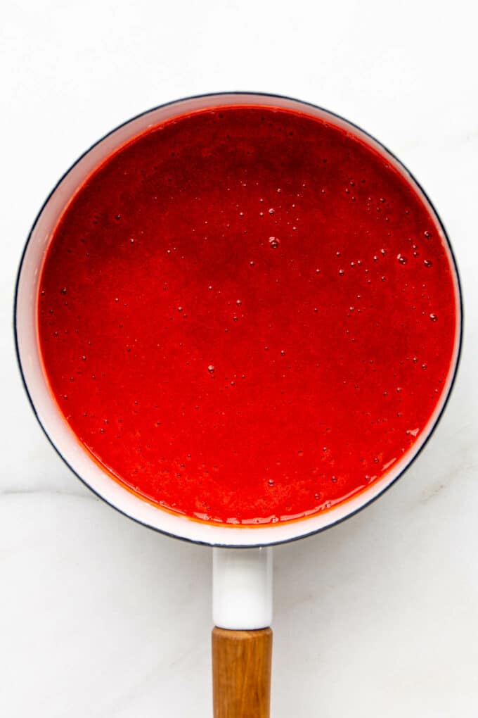 blended strawberries in a pot