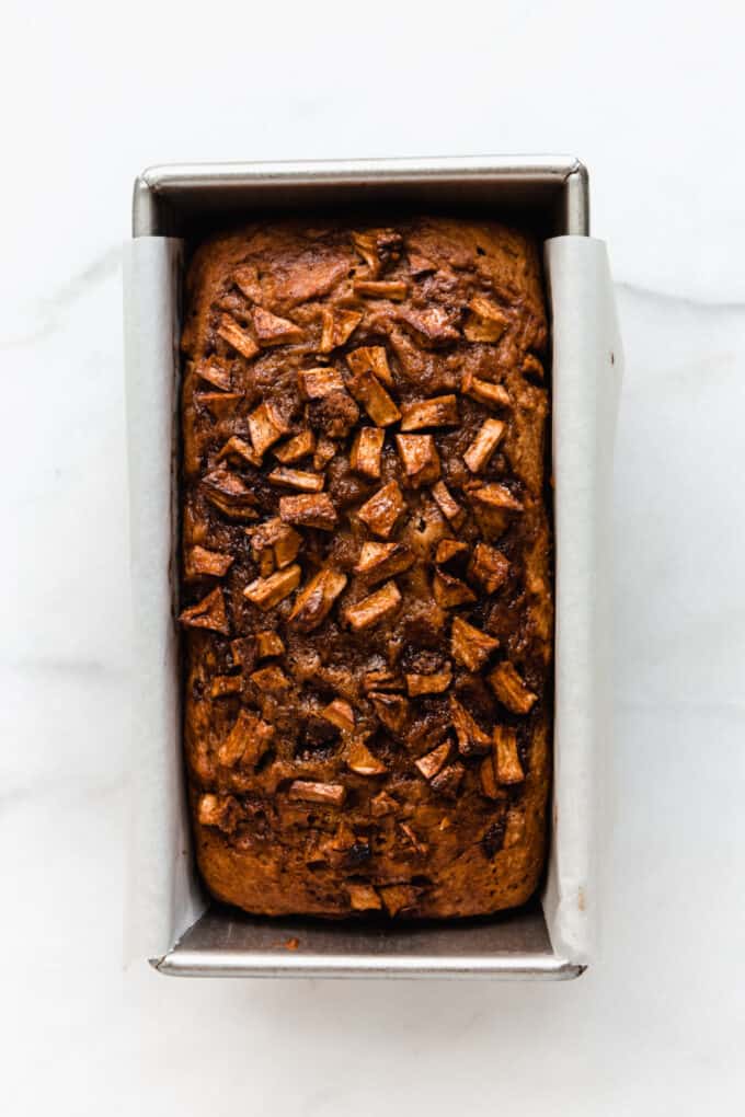 cinnamon apple bread in a loaf pan