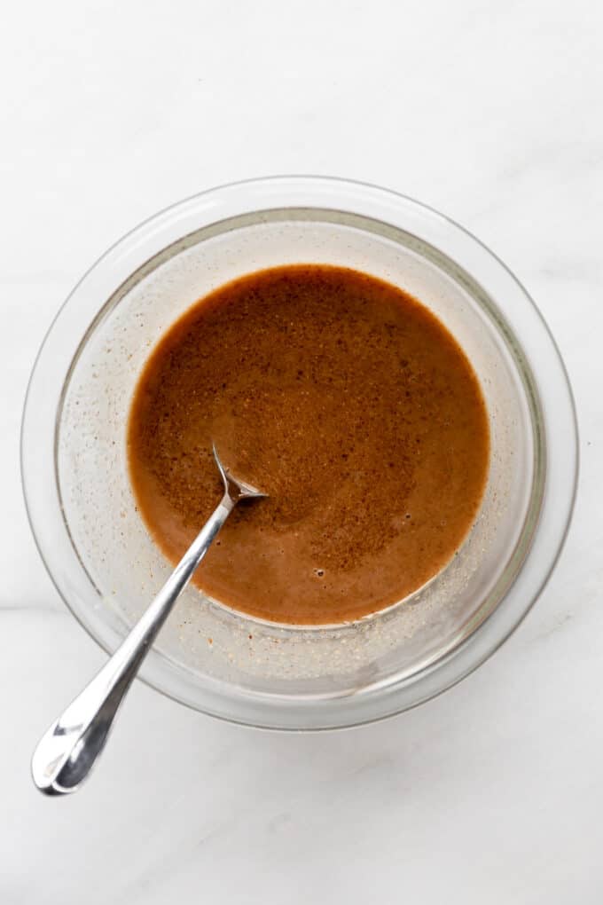 a bowl of almond butter and honey