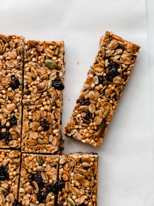 sliced homemade granola bars on parchment paper