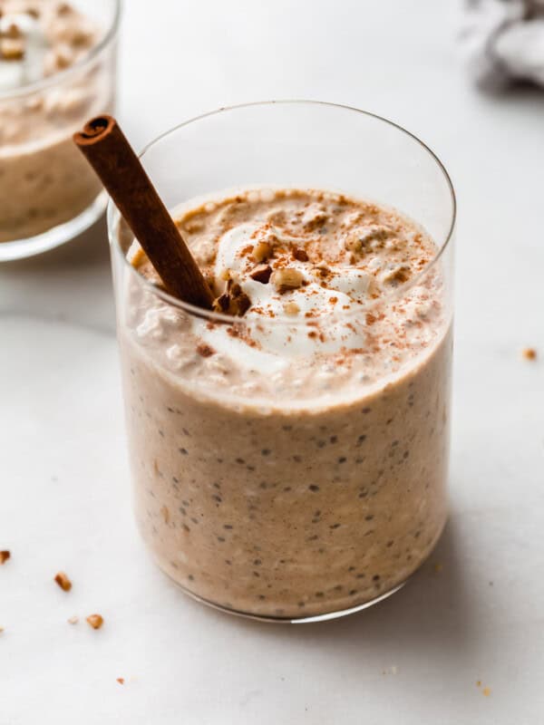 pumpkin overnight oats with a cinnamon stick in it
