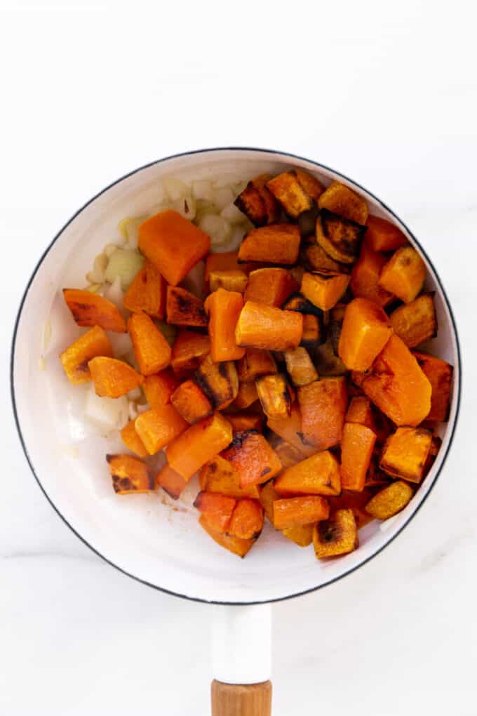 roasted butternut squash and sweet potato in a white pot