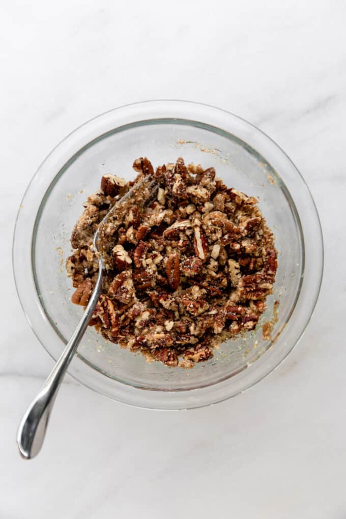 pecan crumble topping mixed in a clear bowl