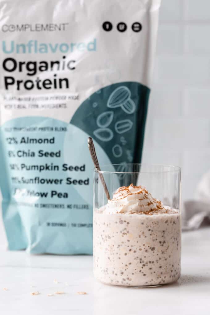 Chai overnight oats with a bag of protein powder on the side