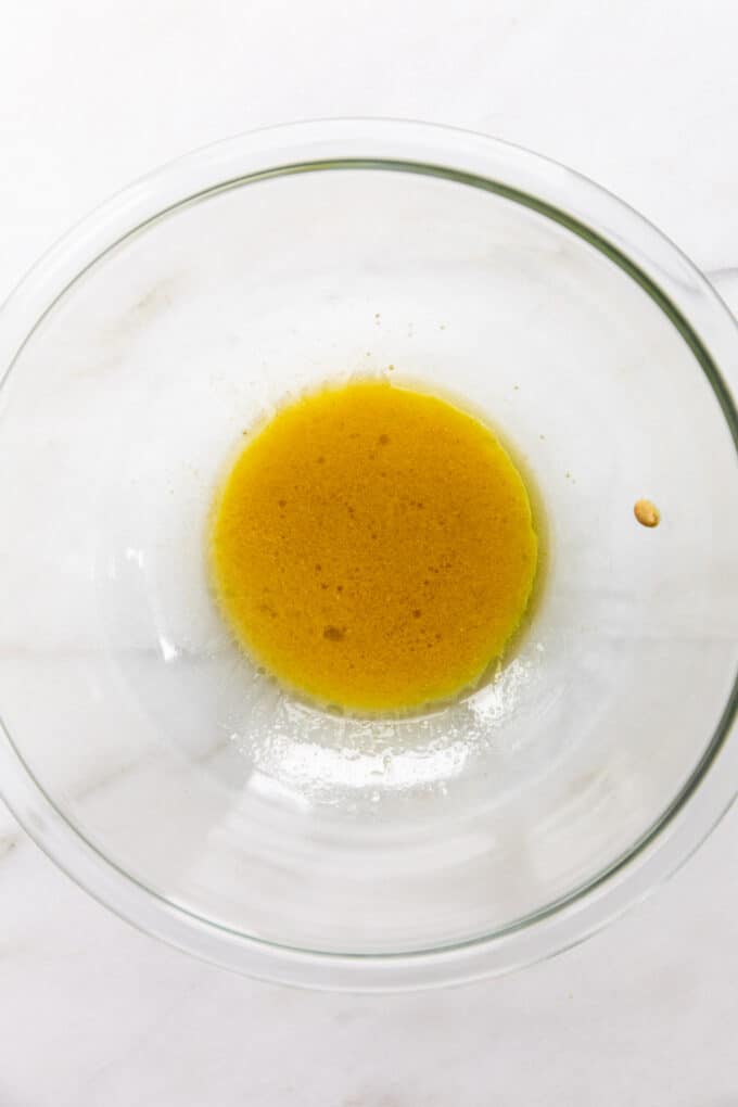 maple dijon dressing in a mixing bowl