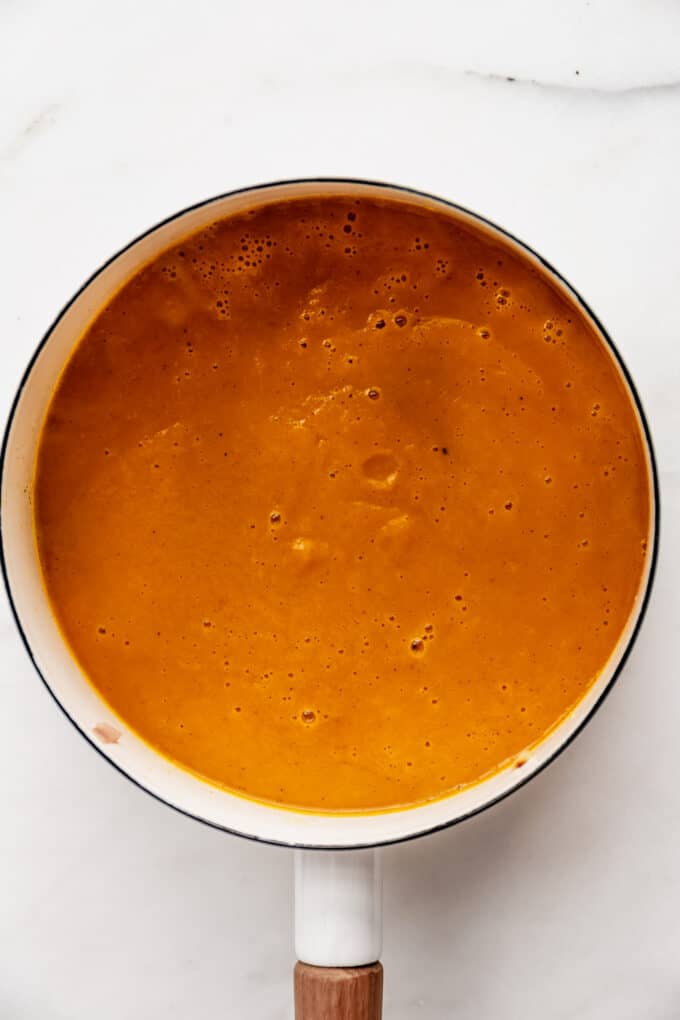 sweet potato carrot and ginger soup in a pot