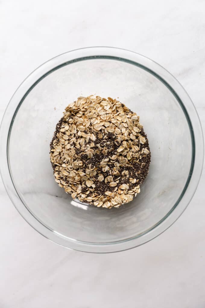 oats and chia seeds in a mixing bowl