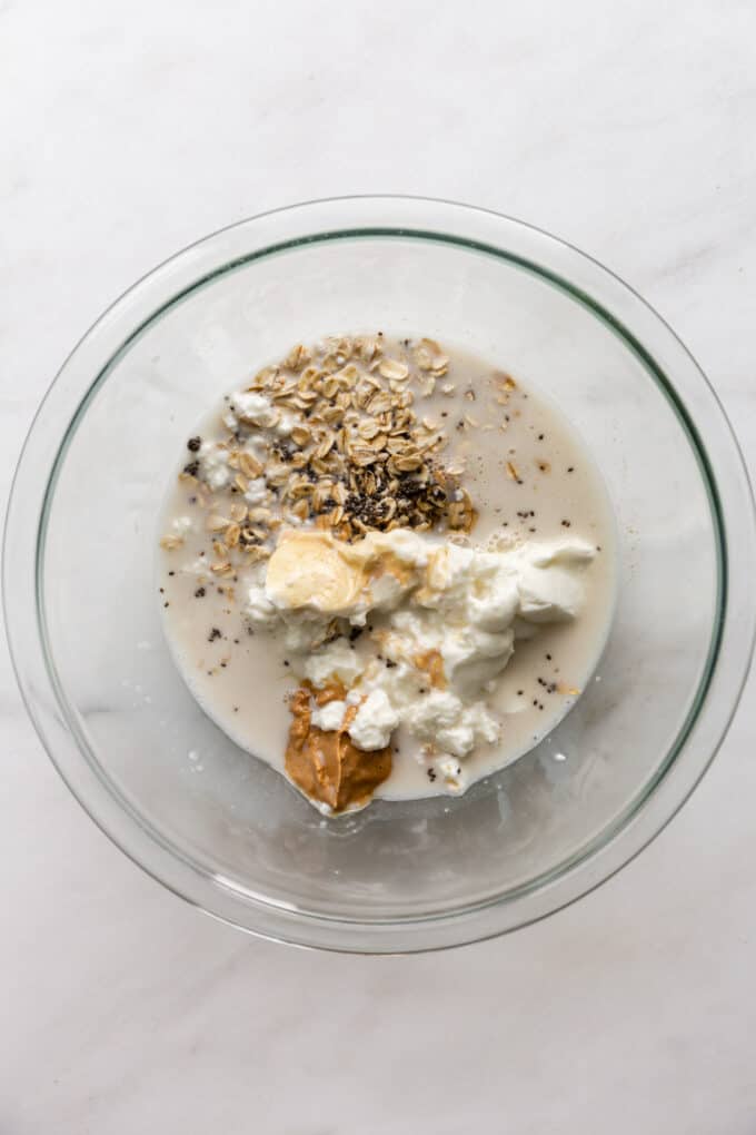 ingredients for cookie dough overnight oats in a mixing bowl