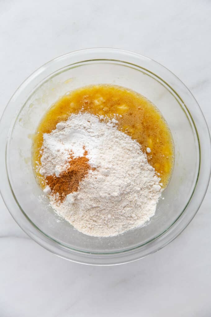 oat flour, spices, mashed banana and egg in a mixing bowl