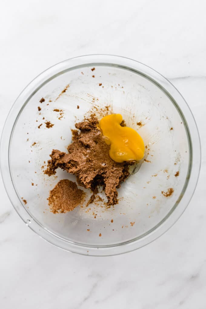 beaten butter and sugar in a mixing bowl with an egg