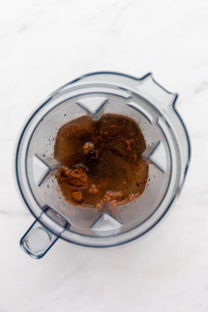 ingredients for vegan chocolate pudding in a blender