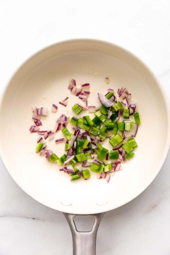 onions and jalapeno in a pan