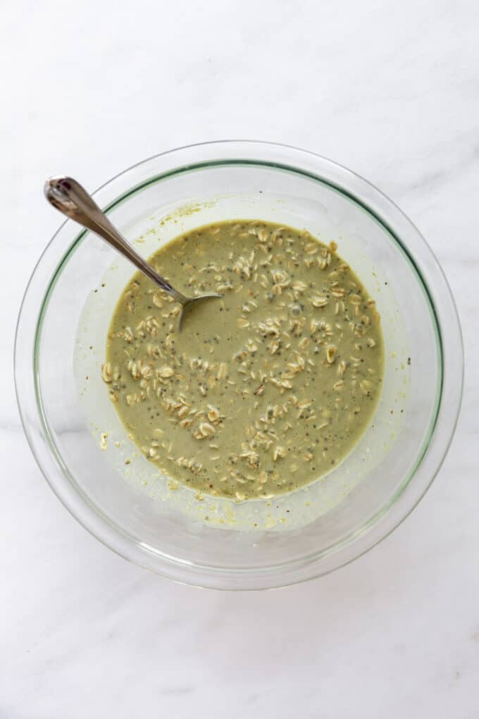 matcha oats with almond milk in a bowl