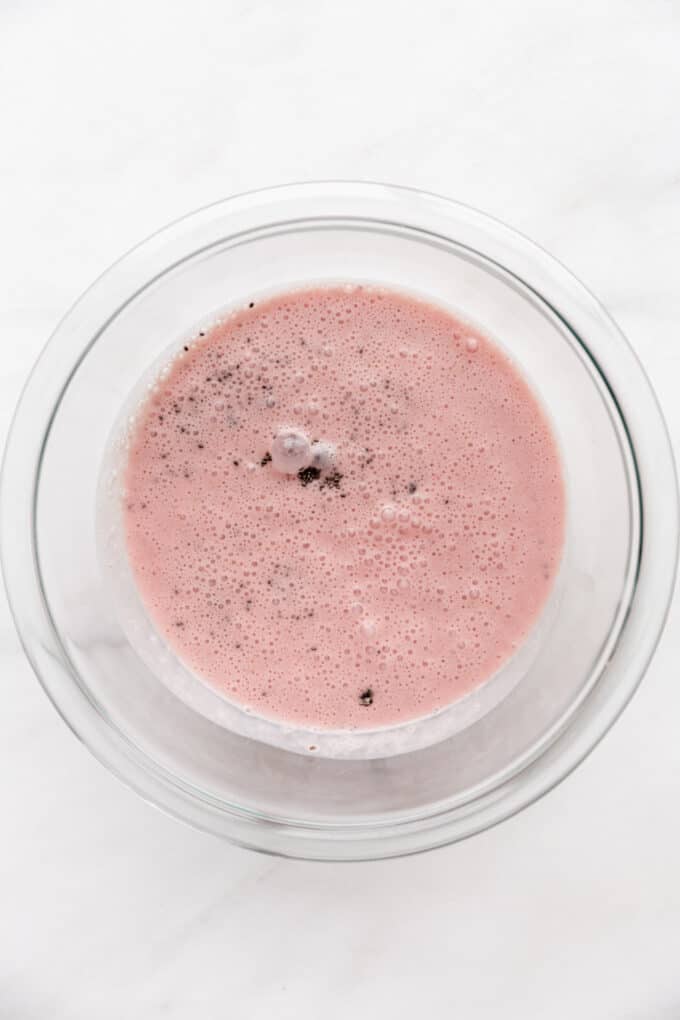 strawberry milk and chia seeds in a bowl