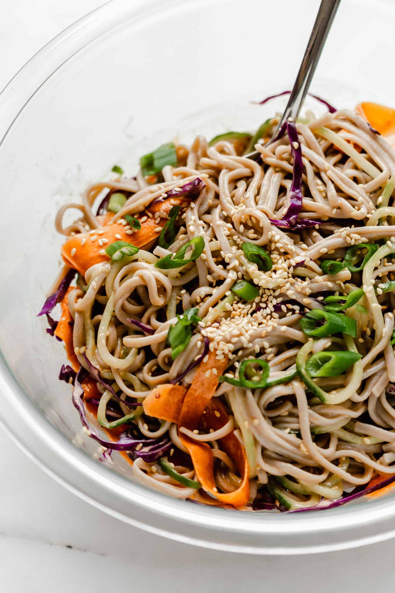soba noodle salad in a serving bowl