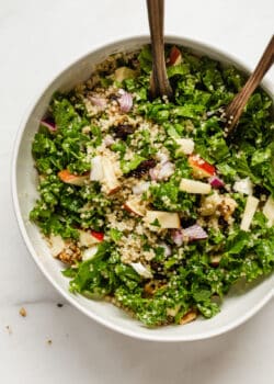 apple quinoa salad in a white bowl