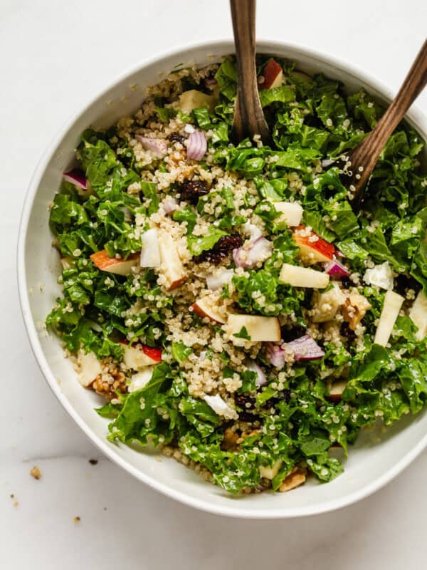 apple quinoa salad in a white bowl