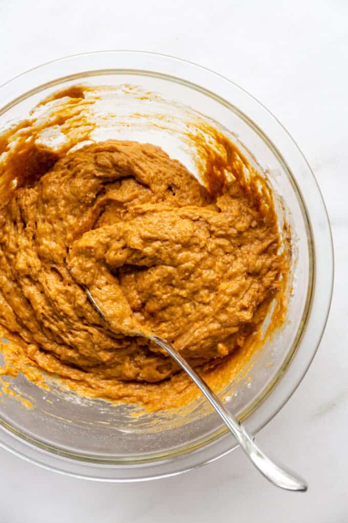 pumpkin banana bread batter in a mixing bowl