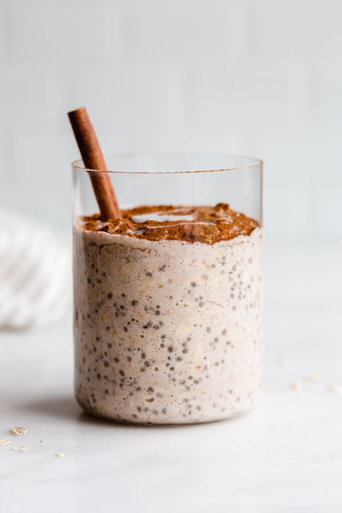 cinnamon roll overnight oats in a cup