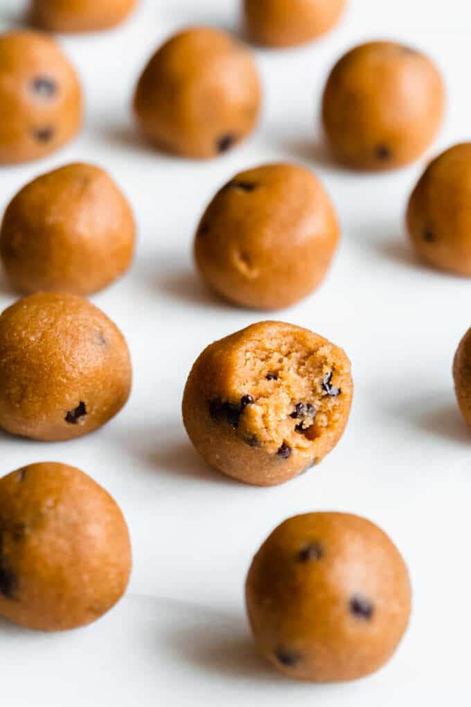 pumpkin protein balls on a marble board