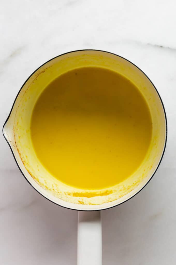 turmeric latte in a white pot