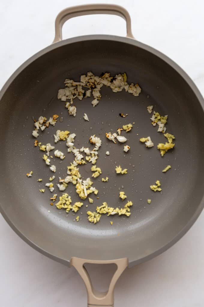 minced garlic and ginger in a pan
