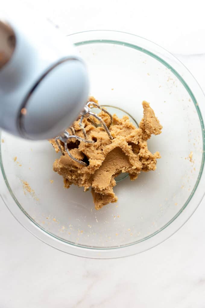 mixed butter and sugar in a mixing bowl