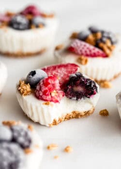 a frozen yogurt granola cup with a bite taken out of it