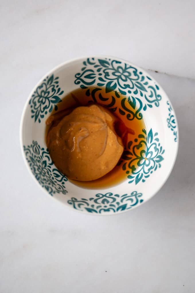maple syrup and peanut butter ina small bowl