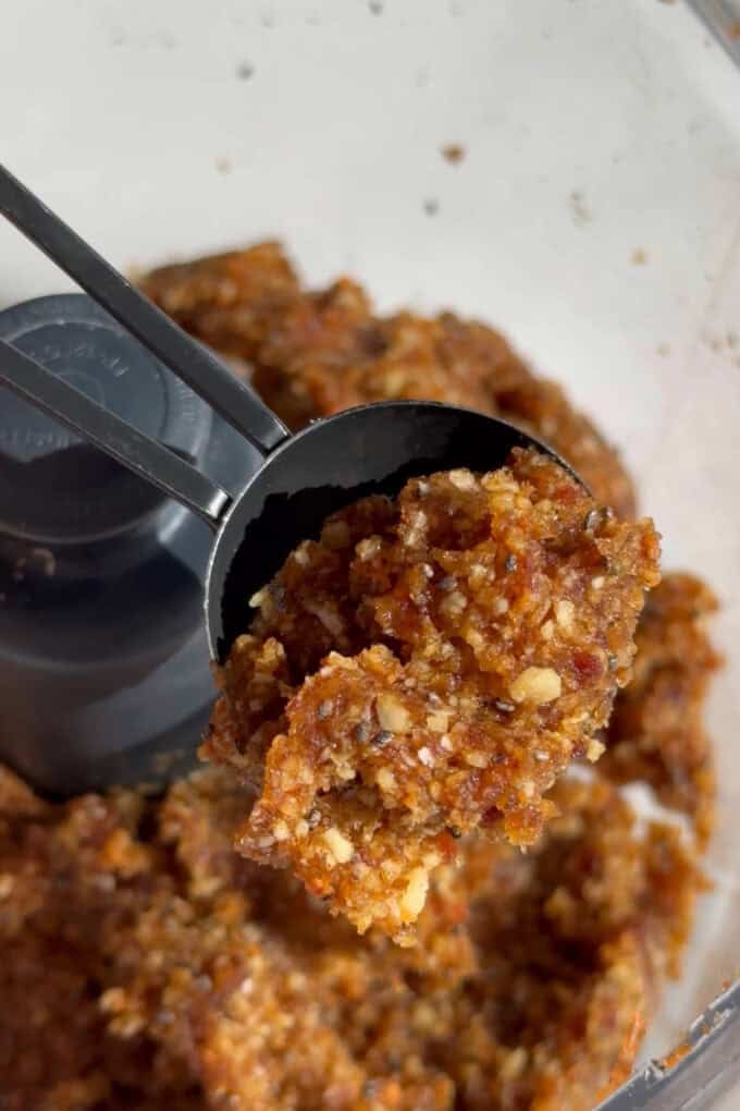 Carrot cake energy ball dough in a tablespoon