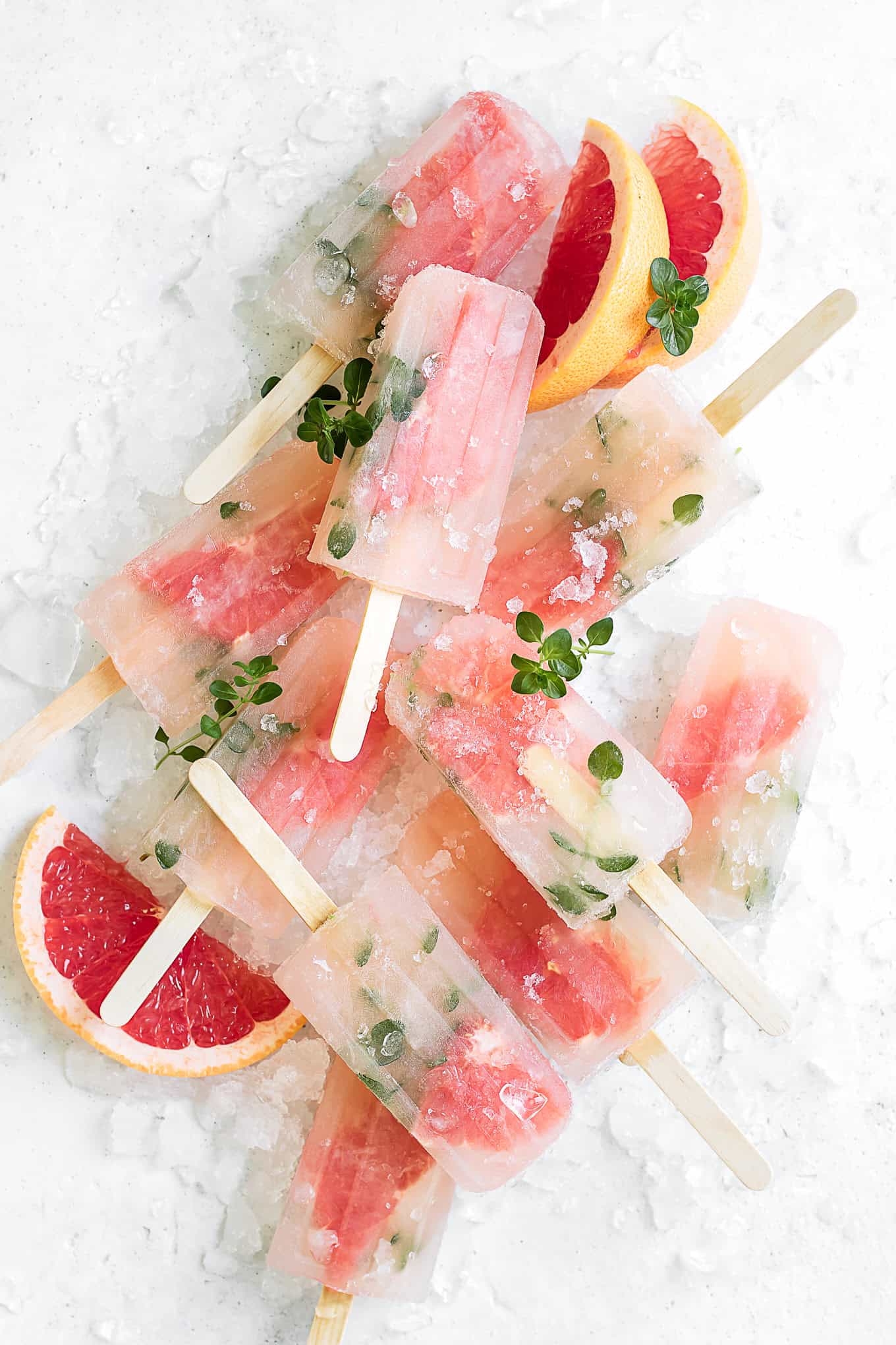 grapefruit thyme popsicles on ice.