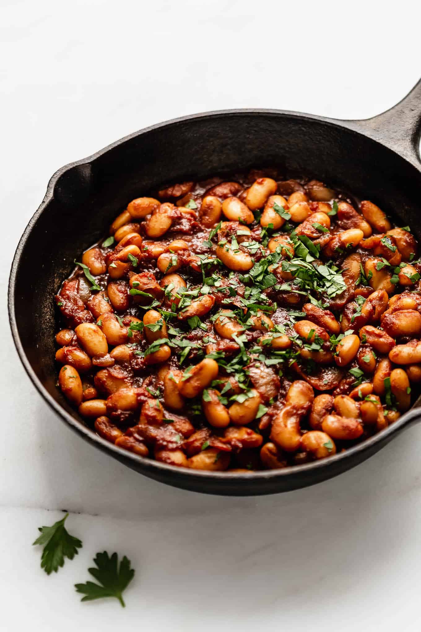 A skillet of maple baked beans.