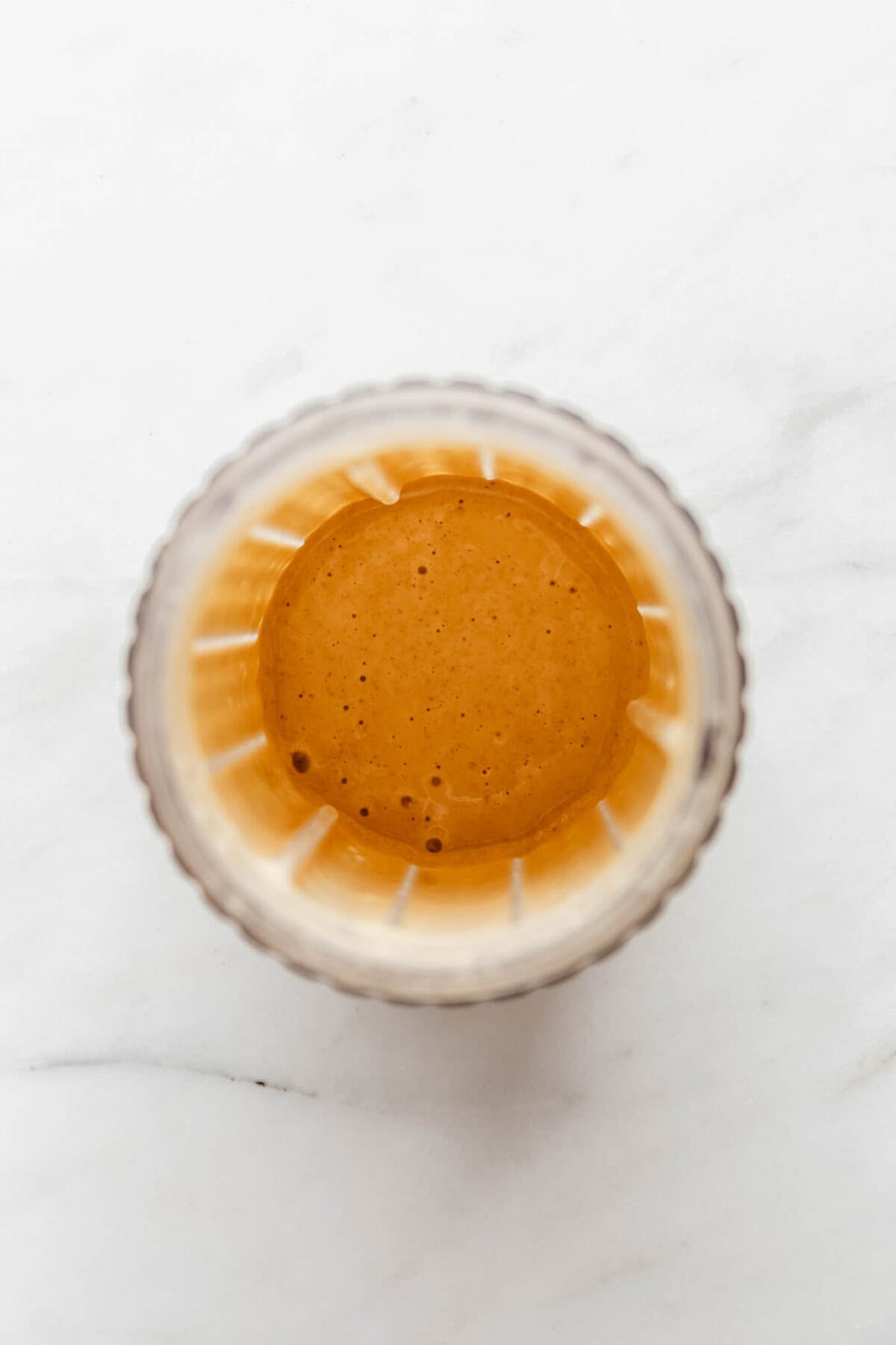 blended pancake bowl batter in a blender container.