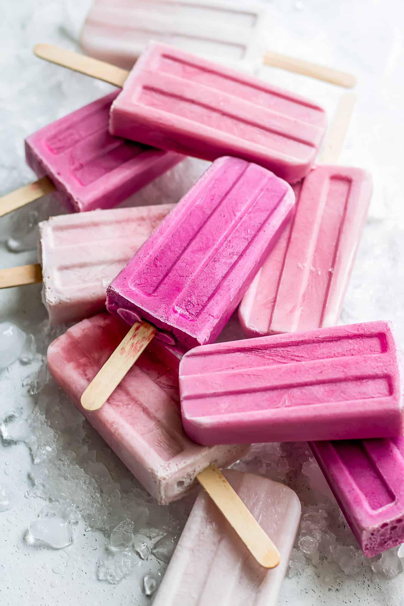 Raspberry creamsicles on a white board.