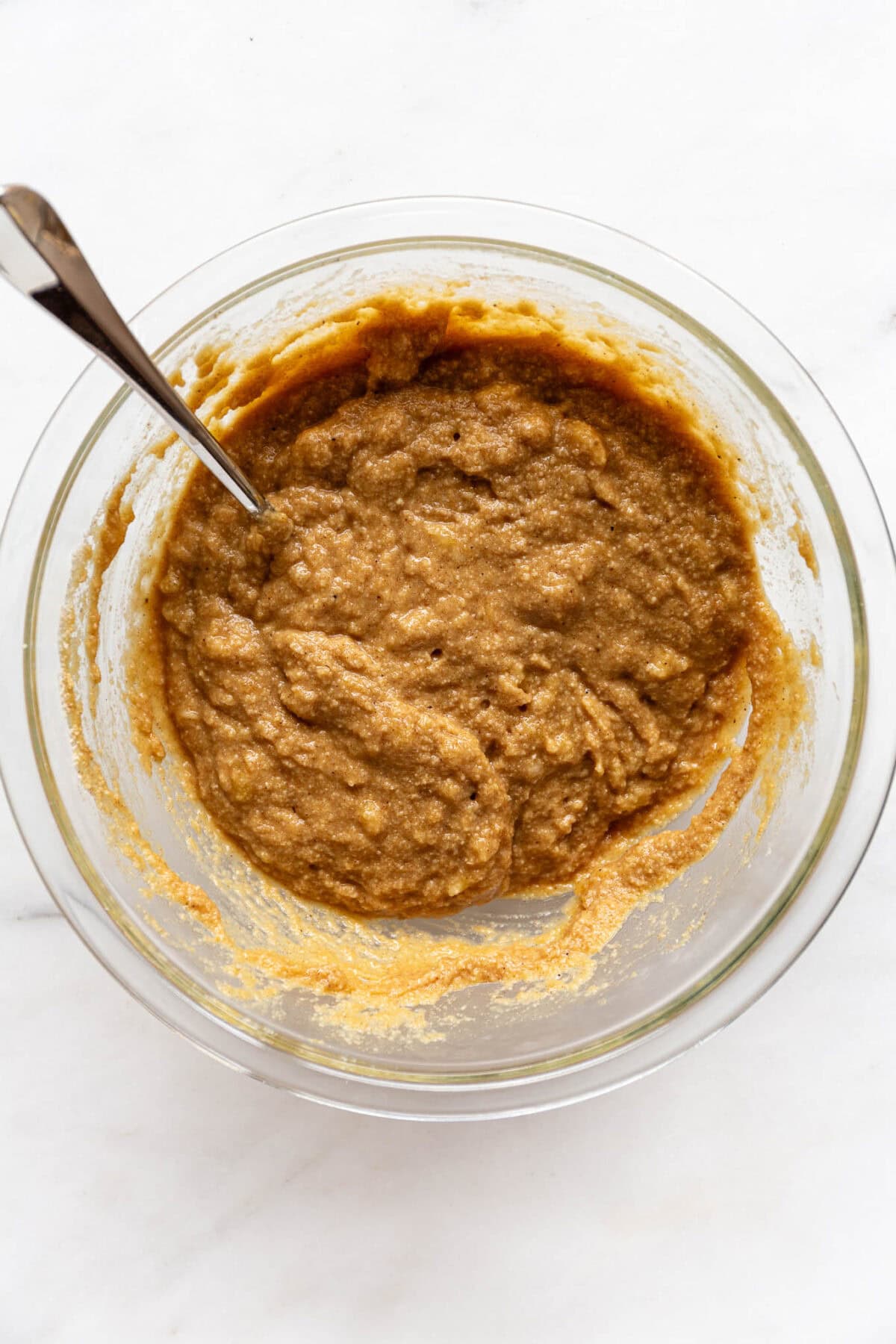 banana almond flour muffin batter in a bowl.