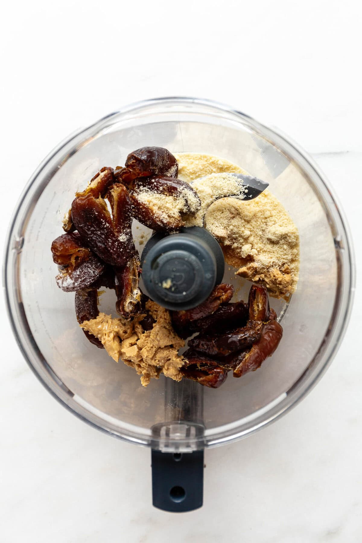dates, cashew butter and almond flour in a food processor.